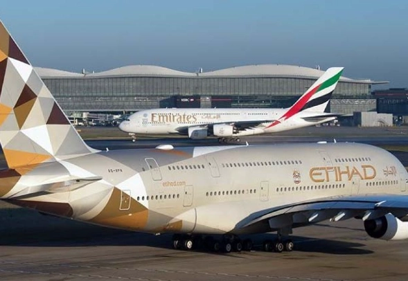 Emirates and Etihad Airlines Aircraft Parked Near Each Other