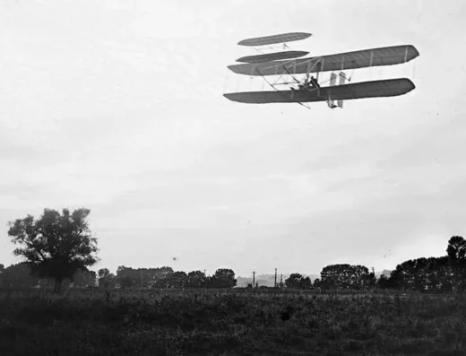 Front view of flight 41, Orville flying to the left at a height of about 60 feet; Huffman Prairie, Dayton, Ohio, September 29, 1905.